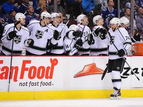 Los Angeles Kings forward Dwight King (74) celebrates his goal against the Vancouver Canucks during the first period at Rogers Arena on Apr 6, 2015.  Anne-Marie Sorvin-USA TODAY Sports