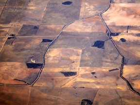 Roads can be seen intersecting drought-affected farming areas located in south-eastern Australia March 21, 2015. A report titled 'Thirsty Country: Climate change and drought in Australia' by the Australian research body the Climate Council, has argued in its latest paper that the probability of drought will increase, and it will become more severe, because of climate change. The crowdfunded body claimed that since the mid-1990s rainfall in southeast Australia had declined between 15 and 20 per cent, and due to a warming climate, rain across southern Australia had "shifted" further south increasing the risk of drought in south-east and south-west Australia. Picture taken March 21, 2015. REUTERS/David Gray