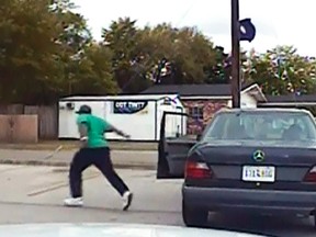 A still image taken from police dash cam video shows Walter Scott running from his vehicle during a traffic stop before he was shot and killed by police officer Michael Slager in North Charleston, S.C., April 7, 2015. (South Carolina Law Enforcement Division)