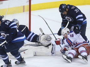 Dustin Byfuglien was suspended four games for this cross check on JT Miller of the Rangers. "I'm lucky he wasn't hurt," Byfuglien said.