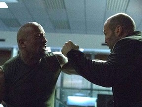 Dwayne Johnson (L) and Jason Statham in Furious 7. 

(Courtesy Universal)
