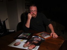 Mike Leblanc in his Midland home with pictures of his wife Deanna Leblanc, who died in hospital in March 2014. (Tracy McLaughlin photo/Special to the Toronto Sun)