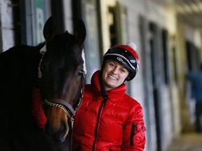 All is now forgiven between Sheena Ryan and Espirituganador after the bay gelding gave the jockey a good knock in the face. (Stan Behal, Toronto Sun)