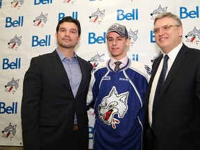 Israeli-born hockey star David Levin, middle, poses with Wolves' coach David Matsos, left, and Blaine Smith, president and GM of the Sudbury Wolves, at a press conference prior to the 2015 OHL Priority Selection. John Lappa/The Sudbury Star