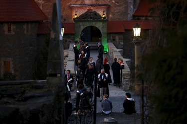 Participants gather in front of the castle before the role play event at Czocha Castle in Sucha, west southern Poland April 9, 2015. Harry Potter enthusiasts from all over the world are attending a four-day live action role play event at the medieval castle made into a close imitation of the 'College of Wizardry'. REUTERS/Kacper Pempel