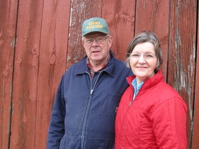 Don and Jean Giffin pose in front of a barn that houses part of their maple syrup operation near Blenheim. Giffin's Maple Syrup Products was named the Chatham-Kent feature industry of the month on Friday.
(BLAIR ANDREWS/ QMI Agency​)