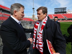 Toronto Mayor John Tory with Maple Leaf Sports & Entertainment CEO Tim Leiweke (l) as he toured the new renovations at BMO Field in Toronto  on Friday April 10, 2015. Michael Peake/Toronto Sun