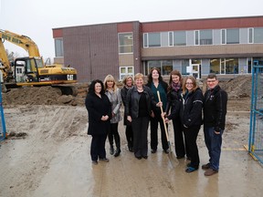 EMILY MOUNTNEY-LESSARD/The Intelligencer
From left: Stirling Public School principal Suzanne Cholasta, Hastings County representative Cathy William-Utman, Hastings Prince Edward District School Board community engagement officer Sandy Smith, director of education Mandy Savery-Whiteway, day care partners Jennifer Kerr, Courtney Lewis and Lindsay Jackson, with Stirling Mayor Rodney Cooney, at the construction site for a new day care facility in Stirling.