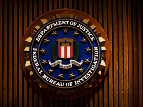 This August 3, 2007 file photo shows a crest of the Federal Bureau of Investigation(FBI) inside the J. Edgar Hoover FBI Building in Washington, DC. AFP PHOTO/MANDEL NGAN / FILES