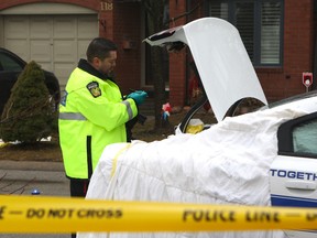 Peel Regional Police investigate after a fellow officer was stabbed in his arm on April 9, 2015 in a confrontation with a 46-year-old  man. (Chris Doucette/Toronto Sun)
