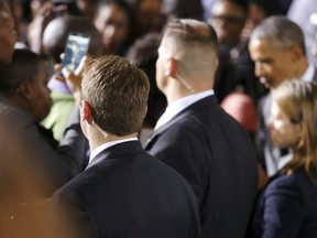 Secret Service agents guard U.S. President Barack Obama in Kingston, Jamaica April 9, 2015. REUTERS/Jonathan Ernst