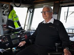Capt. Brian Johnson on board of the Wolfe Island Ferry on Wednesday March 25 2015. Capt. Johnson will be retiring this year after 40 years of operating the ferry. (Annie Sakkab)-KINGSTON WHIG-STANDARD/QMI AGENCY.