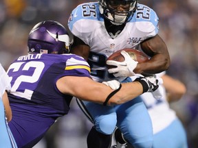 Ottawa RedBlacks lineman Chase Baker #62 tackles Darius Reynaud #25 of the Tennessee Titans during his time with the Vikings. Hannah Foslien/Getty Images/AFP