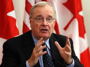 Former Canadian Prime Minister Paul Martin speaks during the Atlantic Council conference on 'The Financial Crisis: Lessons Learned from Canada and the Way Forward' at the Canadian Embassy in Washington November 16, 2011. REUTERS/Kevin Lamarque