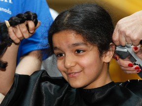 Make-A-Wish Foundation of Eastern Ontario's event in 2010.Here eight year old Varalika Tyagi who has been growing her hair for over five years has it cut. The 2015 event is held Saturday, April 11, 2015.
Tony Caldwell/Ottawa Sun files