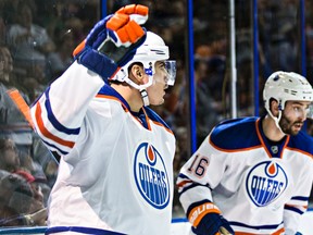Edmonton's Nail Yakupov (10) and Teddy Purcell (16) celebrate a goal during the second period of the Edmonton Oilers' NHL hockey game against the San Jose Sharks at Rexall Place in Edmonton, Alta., on Thursday, April 9, 2015. Codie McLachlan/Edmonton Sun