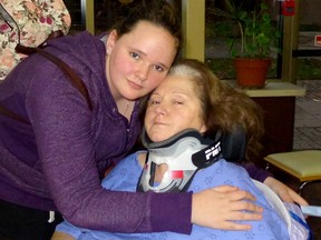 Kathy Gould of Norwich, shown with daughter Franki Heinrichs, is recovering from a severe spinal cord injury at Parkwood Hospital in London. Gould is to attend a country music fundraiser for her Sunday at the Thorndale-area Purple Hill Country Opry hall. (Special to QMI Agency)
