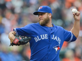 Blue Jays starter Mark Buehrle delivers a pitch during the second inning of his team’s 12-5 victory over the Baltimore Orioles on April 10, 2015, at Oriole Park at Camden Yards. The win was the 200th of Buehrle’s 16-season major-league career. (TOMMY GILLIGAN/USA Today Sports)