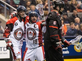 Rock’s Josh Sanderson (left) and Stephen Leblanc celebrate goal against the Vancouver Stealth on Saturday night at the ACC. (CRAIG ROBERTSON/TORONTO SUN)