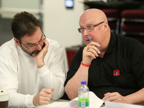 Ottawa 67's head coach Jeff Brown works the whiteboard at TD Place on Saturday during the 2015 OHL Priority Selection Draft. (Chris Hofley/Ottawa Sun)