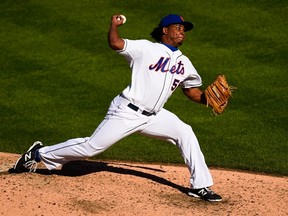 Jenrry Mejia #58 of the New York Mets throws a pitch in the ninth inning against the Houston Astros at Citi Field on September 28, 2014 in the Flushing neighborhood of the Queens borough of New York City.  Alex Goodlett/Getty Images/AFP