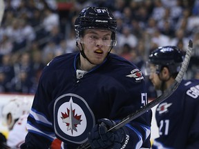 Andrew Copp played his first NHL game — and earned his first point — against Calgary.  (KEVIN KING/Winnipeg Sun)