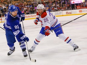 Leafs winger Phil Kessel tries to take a shot against the Montreal Canadiens on Saturday night. (DAVE THOMAS/Toronto Sun)