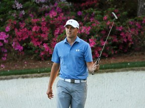 Jordan Spieth of the U.S. celebrates a birdie on the 13th hole during third round play of the Masters golf tournament at the Augusta National Golf Course in Augusta, Georgia April 11, 2015.  REUTERS/Phil Noble