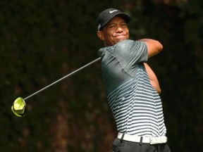 Tiger Woods of the U.S. hits a drive off the second tee during third round play of the Masters golf tournament at the Augusta National Golf Course in Augusta, Georgia April 11, 2015.  REUTERS/Mark Blinch