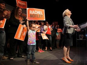 5 year old Mia Lambert cheers as NDP Leader Rachel Notley speaks at a rally at Citadel Theatre in Edmonton, Alta., on April 12, 2015. Perry Mah/Edmonton Sun/QMI Agency