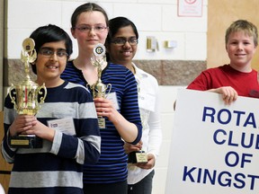Fourth- to first-place finishers Neil Gill, left to right, Jessica McGaughey, Sruthi Amalan and Zach Betts show off their wares after the intermediate Spellers level competition at the 28th annual Kingston Region Spelling Bee on Saturday. (Steph Crosier/The Whig-Standard)