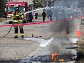 Crews are on scene after an electrical fault caused an oil reservoir to burn near 88 Avenue and 181 Street in Edmonton, Alta., on Sunday, April 12, 2015. Codie McLachlan/Edmonton Sun/QMI Agency