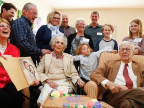 Mary Ann Irwin, left, is all smiles next to her mother, Norma, and father, Ross. Four-generations are pictured in this photo as the family celebrated Norma and Ross' 74th wedding anniversary. (Clifford Skarstedt/Postmedia Network)