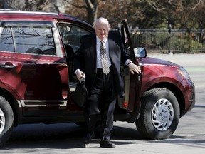 Suspended Senator Mike Duffy arrives at the courthouse in Ottawa April 13, 2015. Duffy, a former ally of Canadian Prime Minister Stephen Harper, is on trial for fraud and bribery in a high-profile case that could hurt the ruling Conservatives' chances of winning an election this October. REUTERS/Chris Wattie