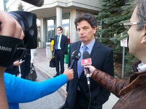 Calypso lawyer Lawrence Greenspon talks with reporters Monday outside the Constellation courthouse after a justice of the peace delivered a verdict on 11 charges against the waterpark. It was found guilty on six charges and not guilty on the others. 
JON WILLING/Ottawa Sun/Postmedia Network