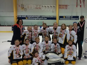 Members of the Mitchell Atom girls hockey team pose with their bronze medals on Sunday, April 12 at the Ontario Women’s Hockey Association (OWHA) ‘C’ championships in Mississauga. SUBMITTED PHOTO