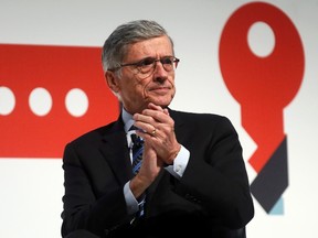 Tom Wheeler, the head of the U.S. Federal Communications Commission, gestures as he delivers a keynote speech during the Mobile World Congress in Barcelona March 3, 2015. REUTERS/Albert Gea