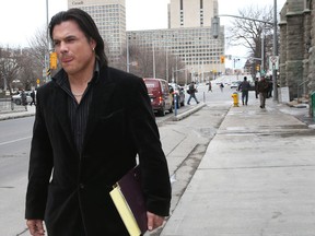 Suspended Senator Patrick Brazeau leaves the Ottawa court house in Ottawa Thursday April 9,  2015. Brazeau was attending the Mike Duffy Trial in Ottawa Thursday. Tony Caldwell/Ottawa Sun/QMI Agency