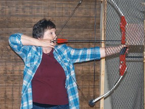 Wallaceburg's Denise Benn takes part in the National Pop'n Jay Archery competition held at the CBD Club on Friday and Saturday. The event brought in archers from across southwestern Ontario.