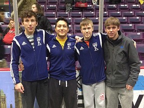 Kingston Wrestling Club members, from left, Ben Zahra, Ameen Aghamiriam, Connor Quinton and T.J. Taylor competed at the Canadian Cadet and Juvenile Wrestling Championships in Fredericton on the weekend. (Supplied photo)