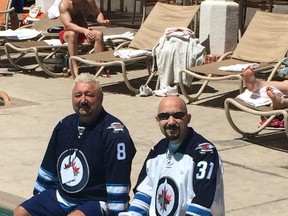 Jet fans Rob Sawatzky (with sunglasses) and Bob St. Laurent will be in Anaheim for Game 1 of the playoffs between the Jets and Ducks. The two Winnipeggers are in Las Vegas for a couple of days before heading to Anaheim. (SUPPLIED PHOTO)