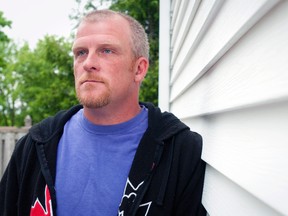 Rodney Stafford, father of murder victim Victoria 'Tori' Stafford, stands outside his apartment in Woodstock, Ont. (Postmedia Network)