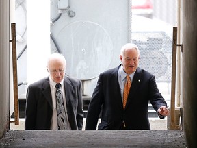 Ben Levin, left, arrives at court with lawyer Clay Ruby to begin three days of sentencing hearing on his conviction on child pornography charges on Monday April 13, 2015. Michael Peake/Toronto Sun