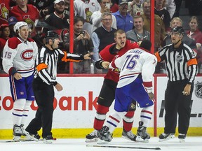 Ottawa Senators' #74 Mark Borowiecki fights with Montreal Canadiens' #76 P.K. Subban during NHL hockey action at the Canadian Tire Centre in Ottawa, Ontario on Friday October 3, 2014. 
ERROL MCGIHON/OTTAWA SUN