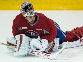 Montreal Canadiens goalie Carey Price sprawls out during practice in this file photo from April 9, 2015. (MARTIN CHEVALIER/LE JOURNAL DE MONTRÉAL/QMI AGENCY)