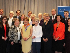 The 16 recipients of the Caring Canadian Award have shown outstanding volunteer work within the Ottawa Hospital. Here they pose with Her Excellency Sharon Johnston (middle yellow), who was present for the ceremony to fill in for her husband, Governor General David Johnston. 
Photo by Dylan Conway-Hartwick