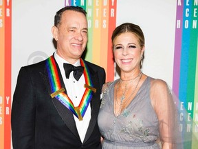 Actor Tom Hanks and his wife Rita Wilson arrive for the Kennedy Center Honors in Washington, December 7, 2014.      REUTERS/Joshua Roberts