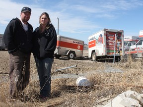 KEVIN RUSHWORTH/HIGH RIVER TIMES. Corey Doherty and his wife Amanda Bekkering had their RV camper van stolen from their gated compound at Start 2 Finish Construction.