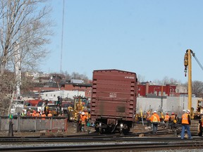 Workers repair a section of track near the Brady Street underpass in Sudbury Tuesday. John Lappa/The Sudbury Star