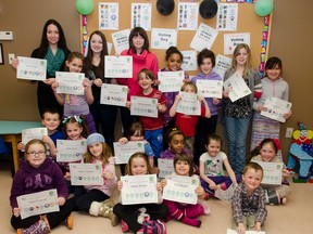 Participants of this year's Forest of Reading pose with their certificates during the Forest of Reading Pizza and Voting day party held at the library on Saturday Apr 11th.